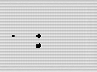 Asteroid £ Metor, ZX81 screen shot with bullet, by Steven Reid, 1984